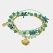 Bracciale in Metallo multifilo con cristalli verdi e conchiglia