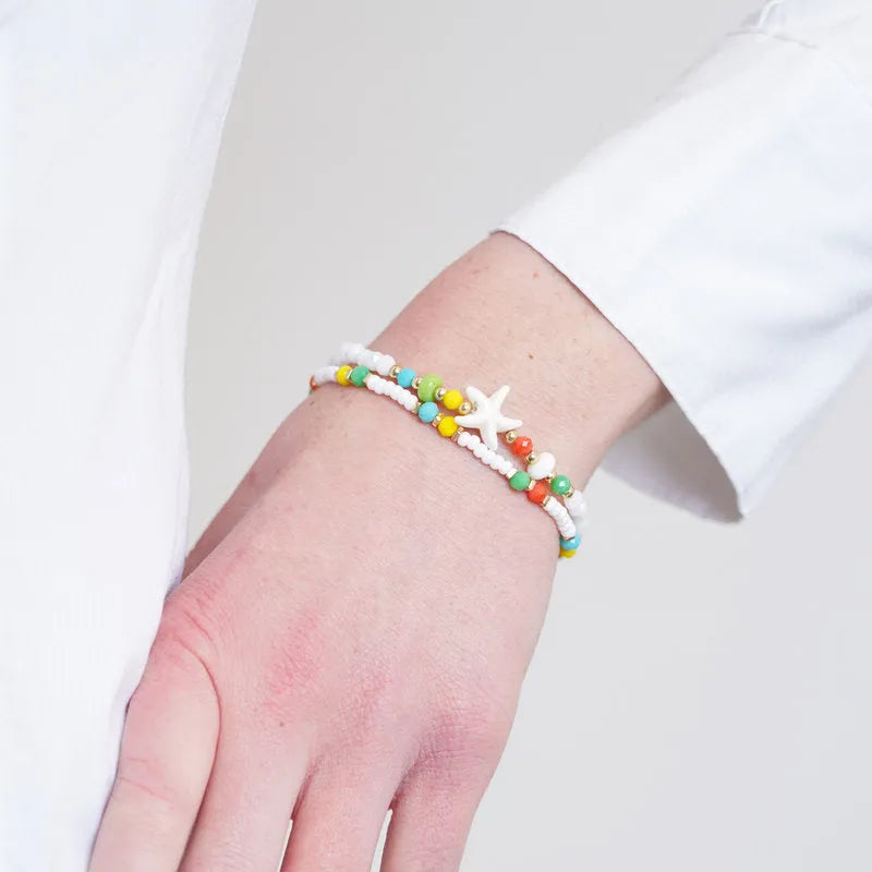 Bracciale in Metallo multifilo con cristallli bianchi e stella marina - BYSIMON gioielli