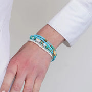 Bracciale in Metallo multifilo con cristalli verdi e margherite