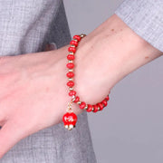 Bracciale in Metallo con sfere e campanella Capri rossa