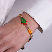 Bracciale in Metallo maglia rolò, con tris di fichi d'india impreziositi da smalti colorati