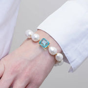 Bracciale in Metallo con perle e cristallo azzurro