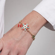 Bracciale in Metallo stelle colorate, fiocco rosso