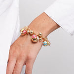 Bracciale in Metallo con sfere impreziosite da fiori colorati pendenti - BYSIMON gioielli