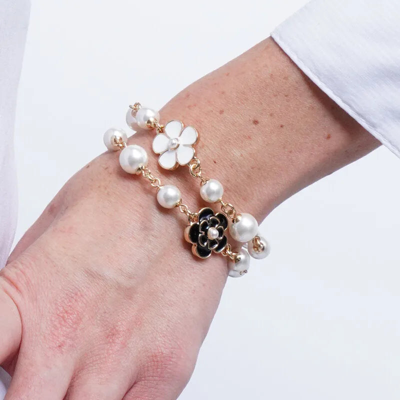 Bracciale in Metallo sfere bianche fiori bianchi e neri