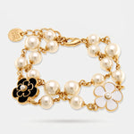 Bracciale in Metallo sfere bianche fiori bianchi e neri - BYSIMON gioielli