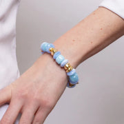Bracciale in Metallo elastico donna pietre dure azzurro celeste placcato oro