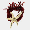 Bracciale in Metallo con pietre rosse e stella marina con rifinitura martellata