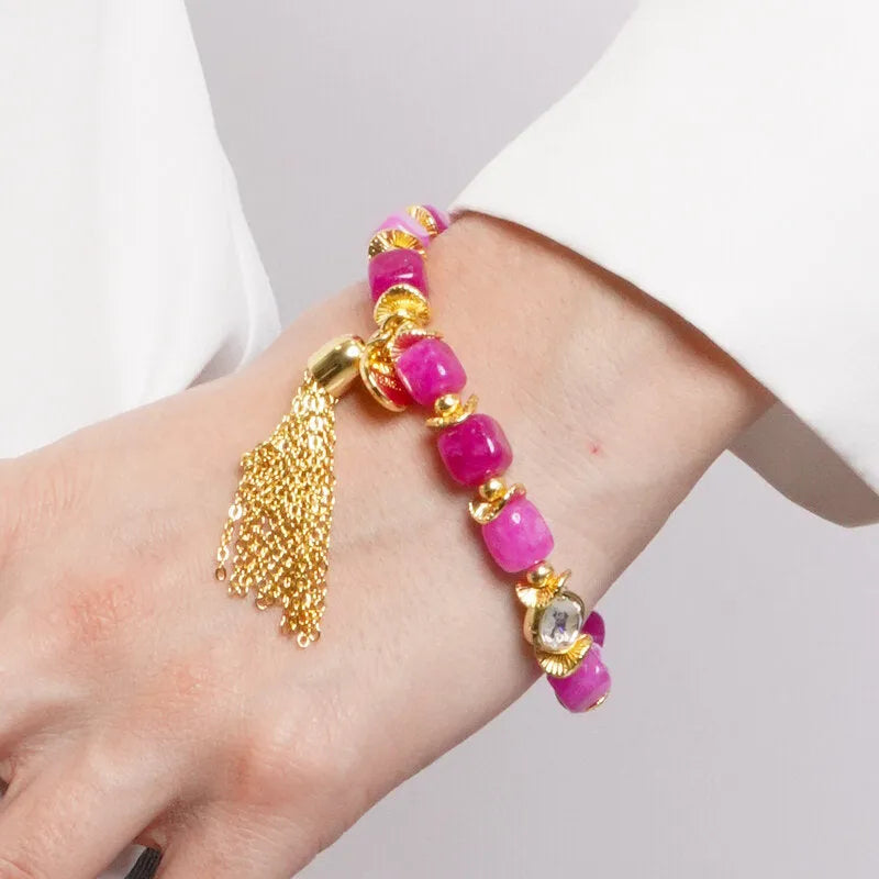 Bracciale in Metallo pietre rosa con pendente