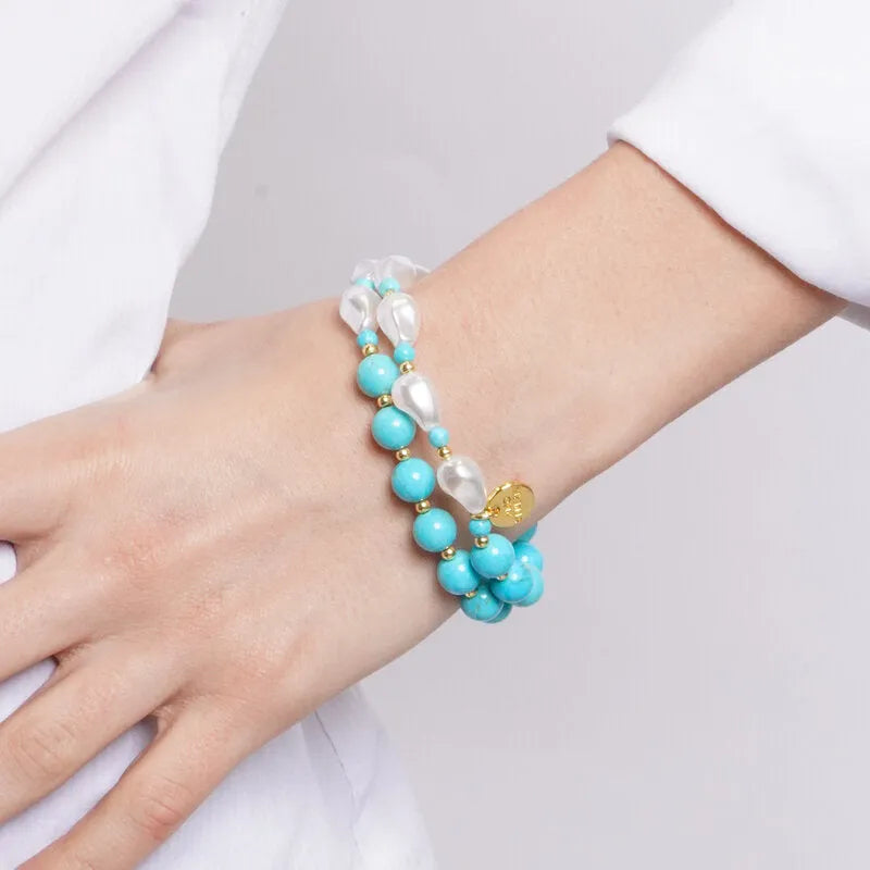 Metal bracelet with turquoise and white beads