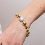 Bracciale in Metallo Dorato sfere medaglione grigio donna