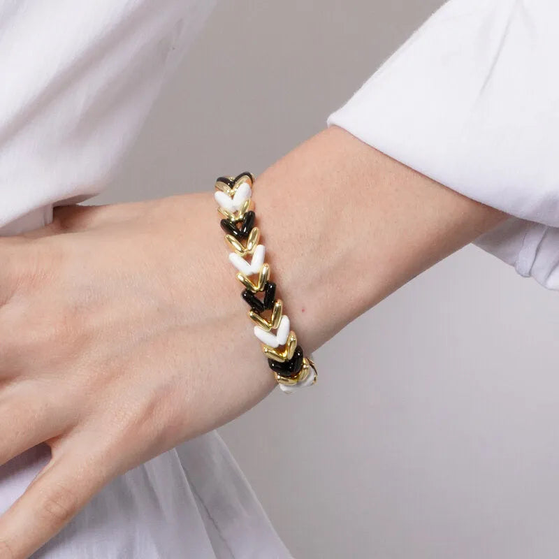 Bracciale in Metallo elastico con maglie intrecciate bianche, nere e oro