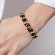 Bracciale in Metallo elastico con maglie ondulate nere e oro