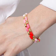 Elastic metal bracelet with smooth links in shades of pink
