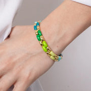 Bracciale in Metallo elastico con maglie lisce sui toni del verde
