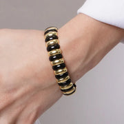 Bracciale in Metallo elastico con maglie nere e oro