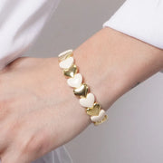 Bracciale in Metallo elastico con maglie a forma di cuore bianche e oro