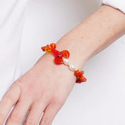 Bracciale in Metallo elastico con Vetro Murano pesce rosso e pietre rosse e bianche