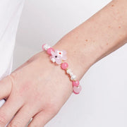 Bracciale in Metallo elastico con Murano Stone pesce rosa e pietre bianche e rosa