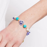 Bracciale in Metallo con Murano Stone pietre bianche e cuore blu