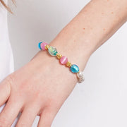 Bracciale in Metallo elastico con pietre bianche, rosa e azzurre