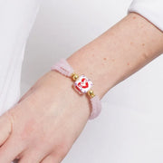 Bracciale in Metallo elastico multifilo con pietre rosa e cuore rosso