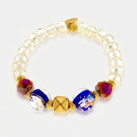 Bracciale in Metallo elastico con pietre bianche, rosse e blu - BYSIMON gioielli