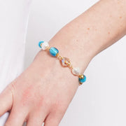 Bracciale in Metallo con pietre ovali turchesi arancio, dorato