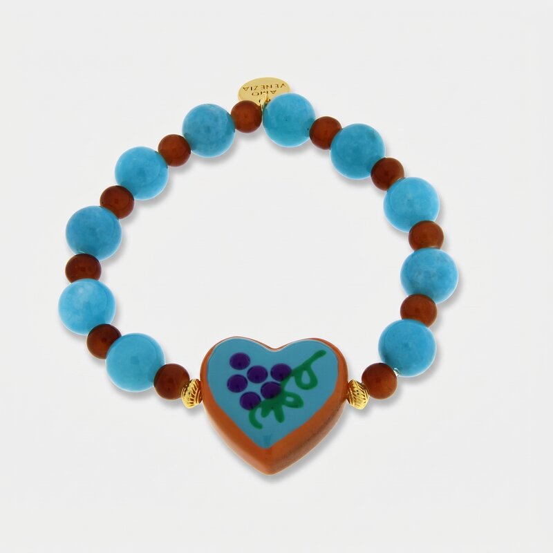 Bracciale in Metallo elastico con cuore turchese e perle rosse e azzurre - BYSIMON gioielli
