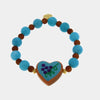Bracciale in Metallo elastico con cuore turchese e perle rosse e azzurre