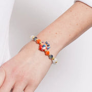 Bracciale in Metallo con murano stone, pesciolino nero arancio dorato