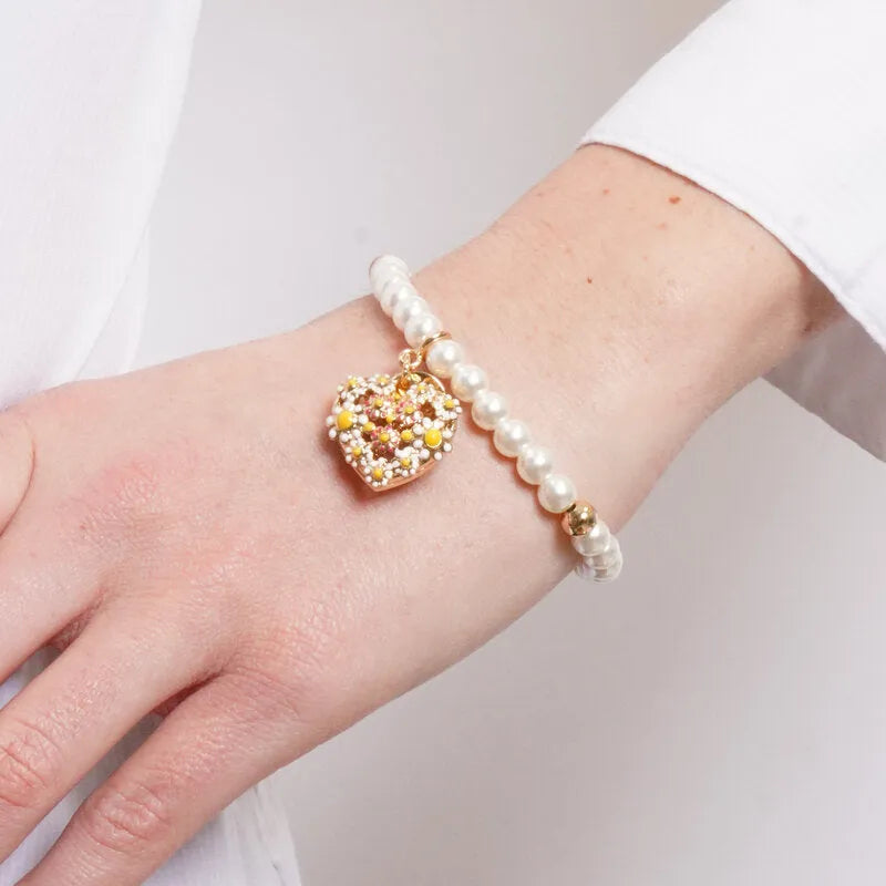 Bracciale in Metallo perle avorio sfere dorate cuore pendente margherite colorate Capri