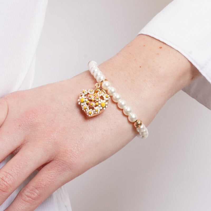 Bracciale in Metallo perle avorio sfere dorate cuore pendente margherite colorate Capri