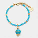 Bracciale in Metallo con filo di sfere azzurre e campanella azzurra con scritta capri - BYSIMON gioielli