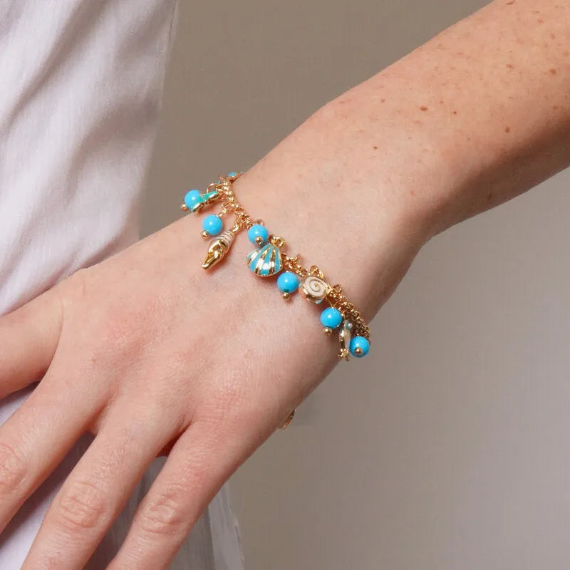 Bracciale in Metallo con simboli marini pendenti e pietre azzurre BYS - gioiello BySimon