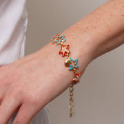 Bracciale in Metallo con stelle marine smaltate e conchiglie