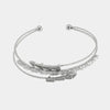 Bracciale in Metallo Rigido Intrecciato Cristalli
