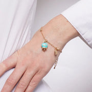 Bracciale in Metallo con campanella portafortuna turchese