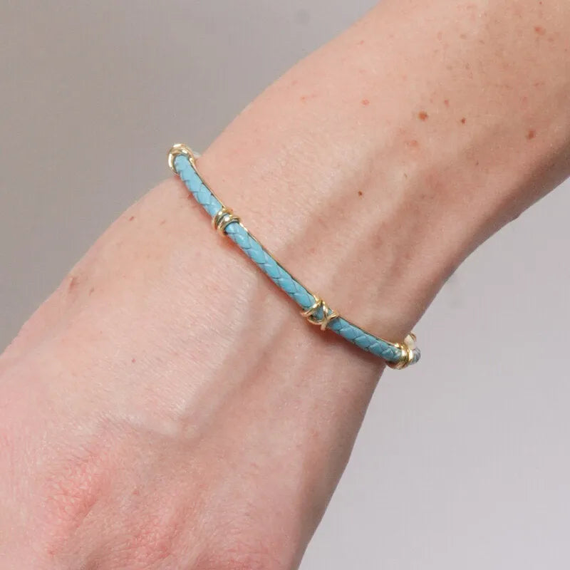 Bracciale in Metallo semirigido in simil pelle intrecciata turchese