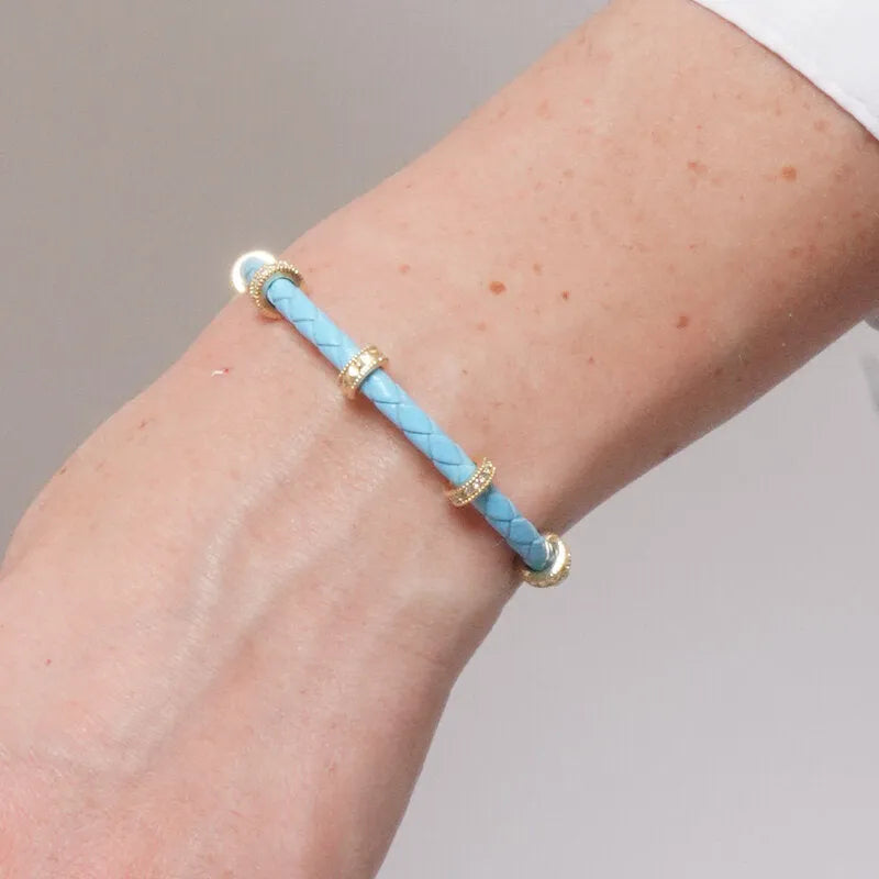 Bracciale in Metallo semirigido in simil pelle intrecciata turchese