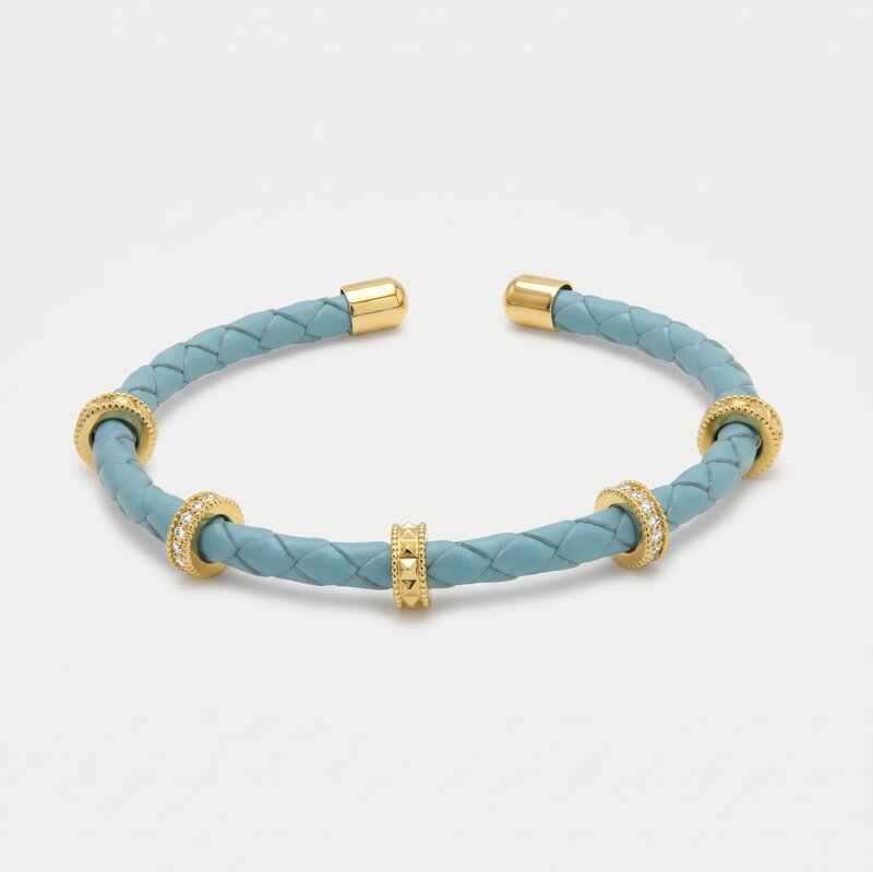 Bracciale in Metallo semirigido in simil pelle intrecciata turchese - BYSIMON gioielli