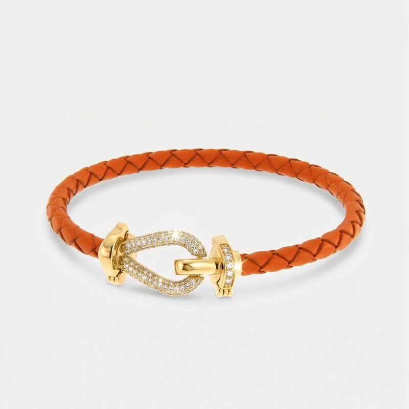 Bracciale in Metallo simil pelle intrecciata arancione con chiusura gioiello dorata - BYSIMON gioielli