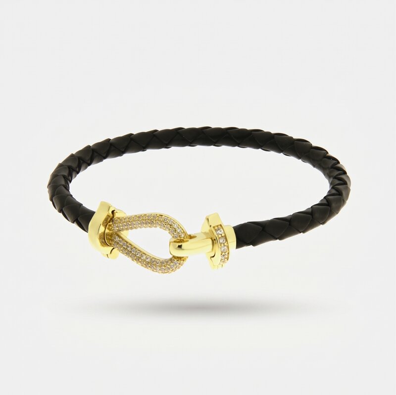 Bracciale in Metallo simil pelle intrecciata nero con chiusura gioiello dorata - BYSIMON gioielli