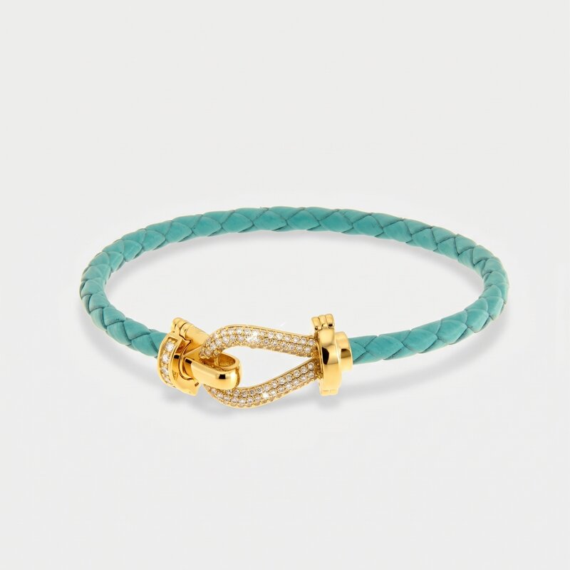 Bracciale in Metallo simil pelle intrecciata turchese con chiusura gioiello dorata - BYSIMON gioielli