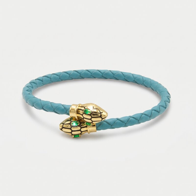 Bracciale in Metallo simil pelle intrecciata turchese con chiusura serpenti dorati - BYSIMON gioielli