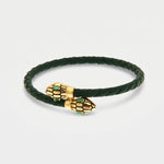 Bracciale in Metallo simil pelle intrecciata verde petrolio con chiusura serpenti dorati - BYSIMON gioielli