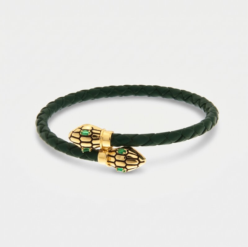 Bracciale in Metallo simil pelle intrecciata verde petrolio con chiusura serpenti dorati - BYSIMON gioielli
