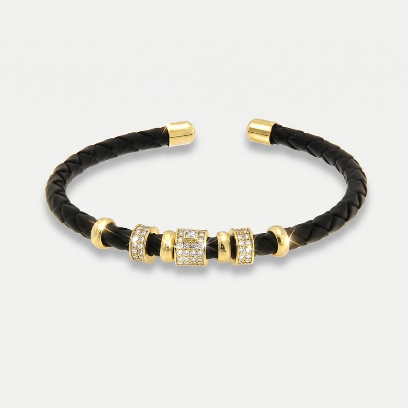 Bracciale in Metallo semirigido in simil pelle intrecciata nero dettagli dorati centrali - BYSIMON gioielli