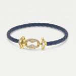 Bracciale in Metallo simil pelle intrecciata blu con chiusura gioiello dorata - BYSIMON gioielli