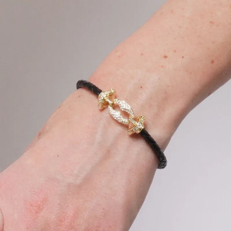 Bracciale in Metallo simil pelle intrecciata nero con chiusura gioiello dorata